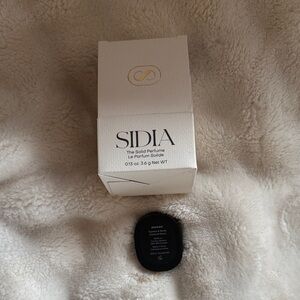NIB SIDIA Solid Perfume in fragrance SOAKED - White Box with Black Compact